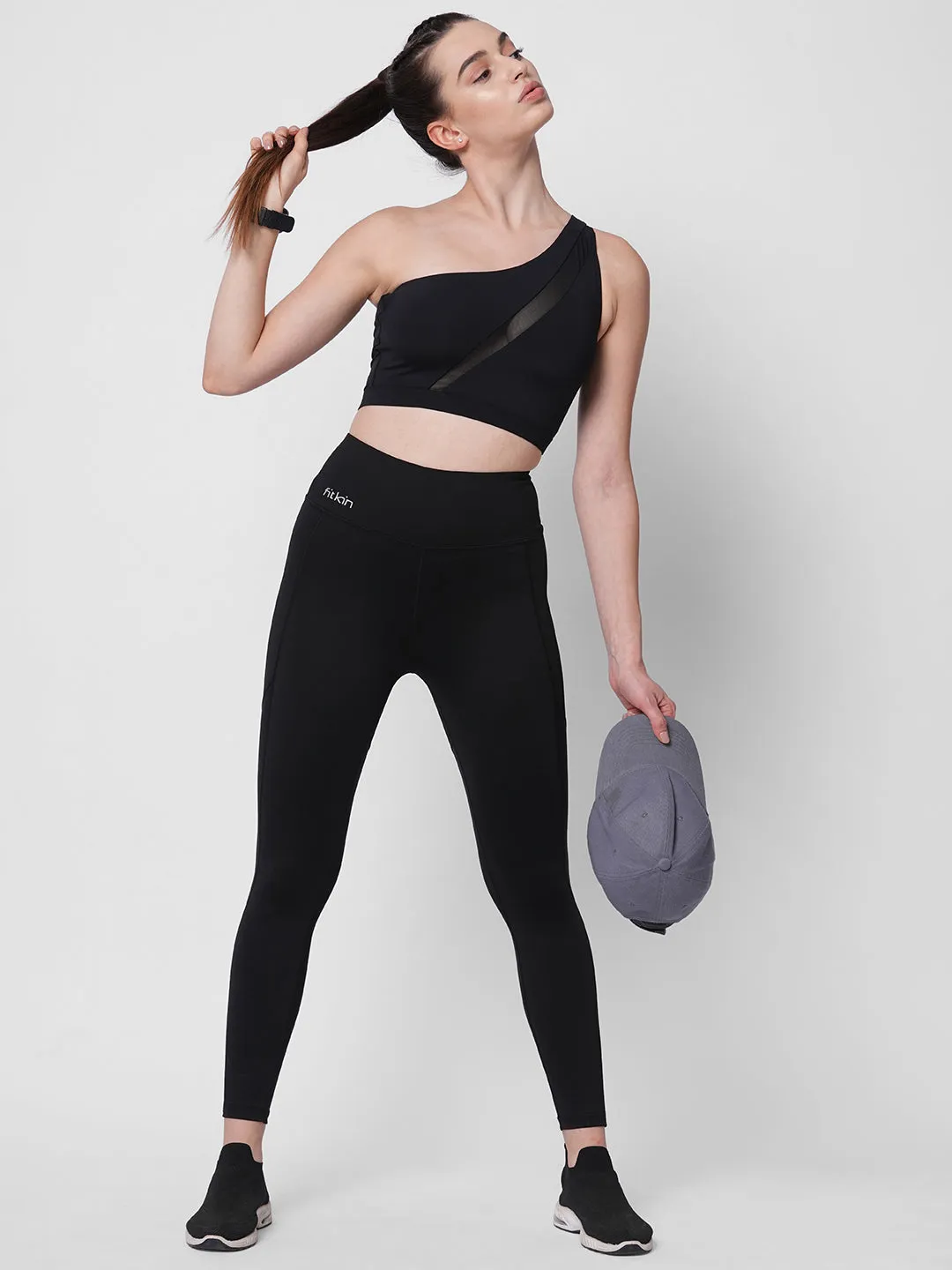 Black one shoulder center net detail sports bra