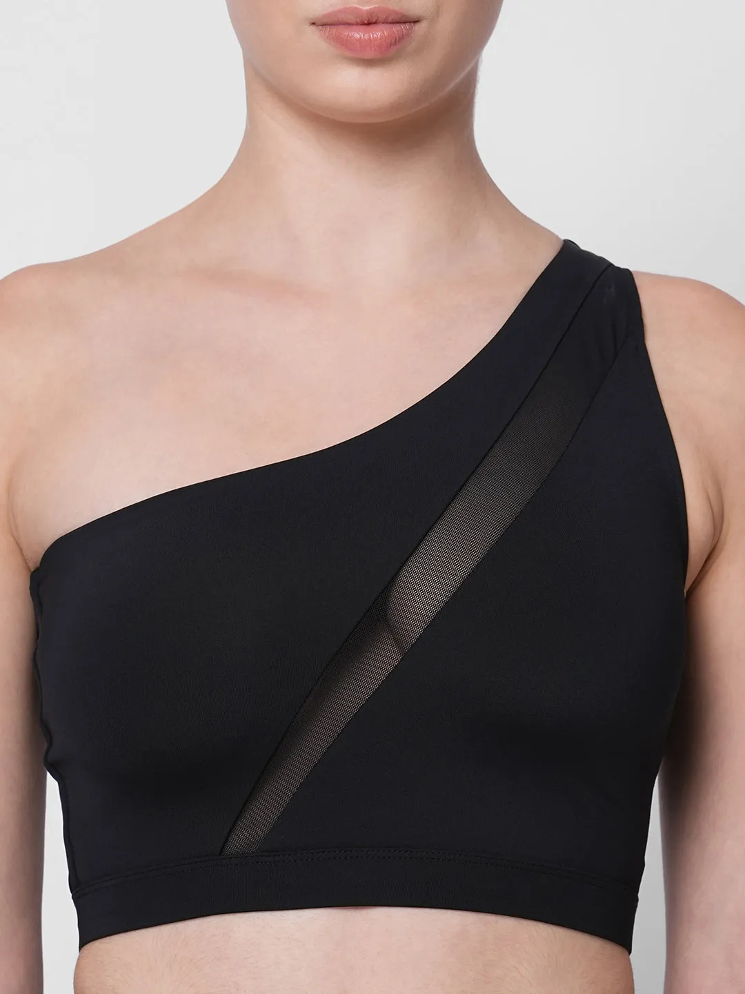 Black one shoulder center net detail sports bra
