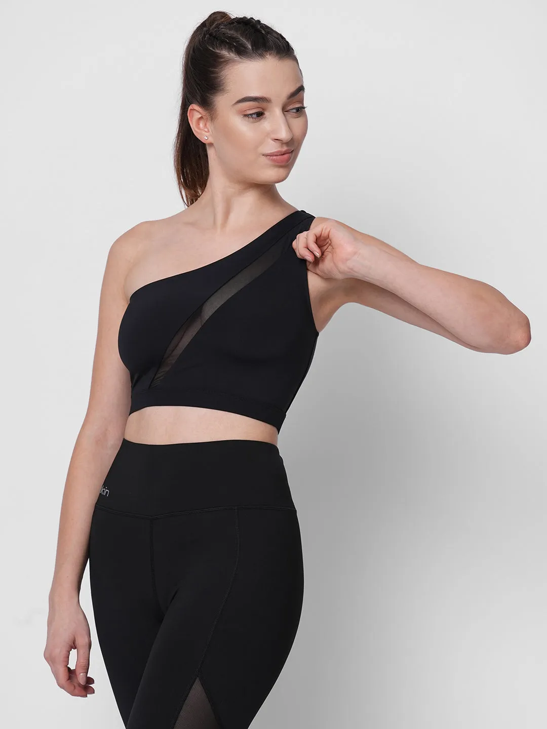 Black one shoulder center net detail sports bra