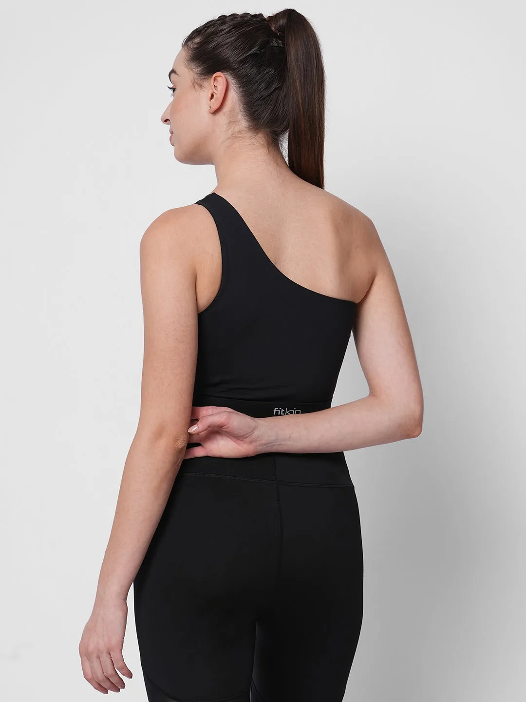 Black one shoulder center net detail sports bra