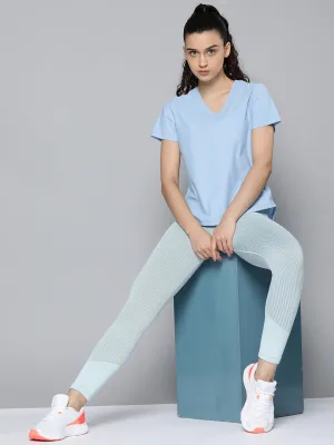 Fitkin Women Blue Solid T-shirt With Curved Hem
