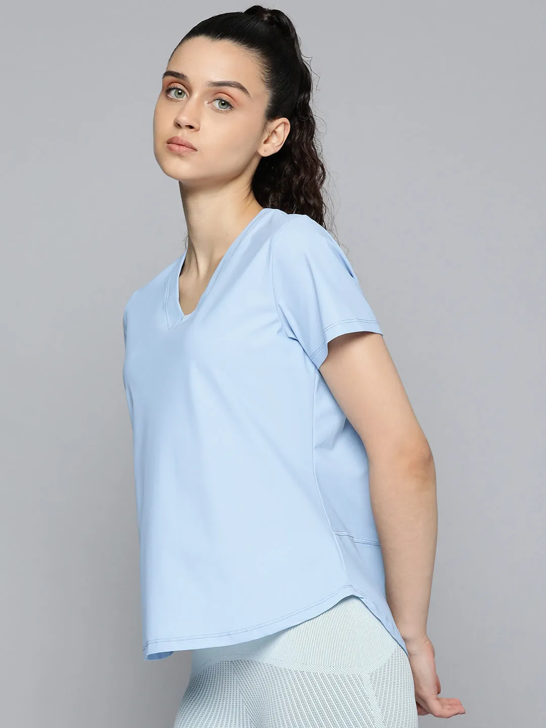 Fitkin Women Blue Solid T-shirt With Curved Hem