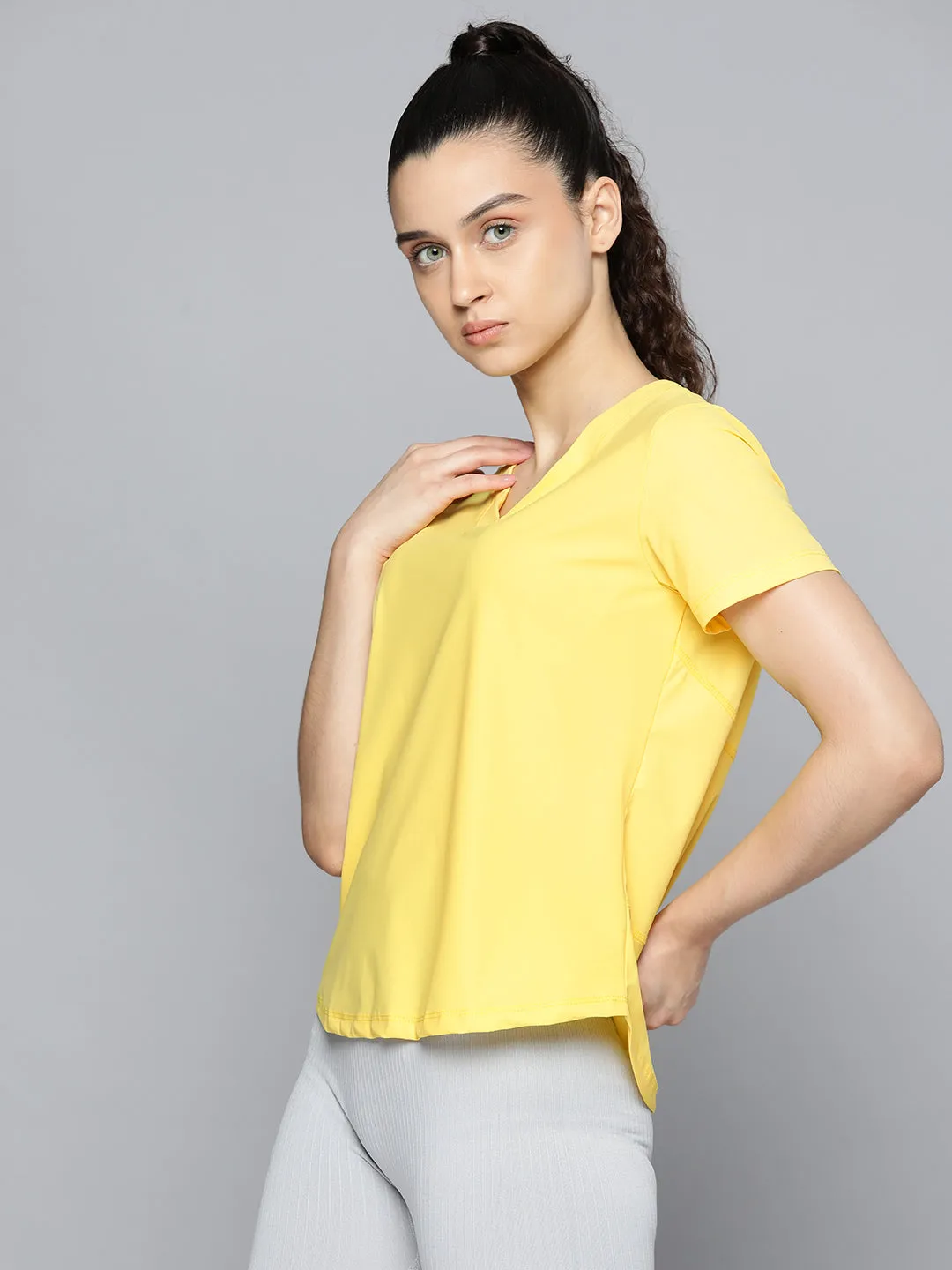 Fitkin Women Yellow Solid T-shirt With Curved Hem