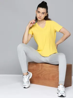 Fitkin Women Yellow Solid T-shirt With Curved Hem