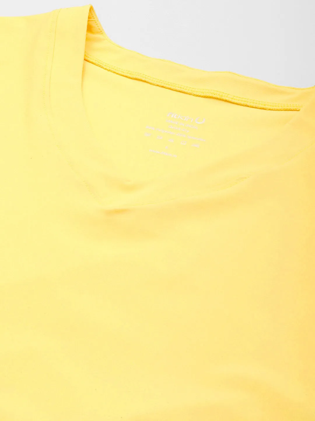Fitkin Women Yellow Solid T-shirt With Curved Hem