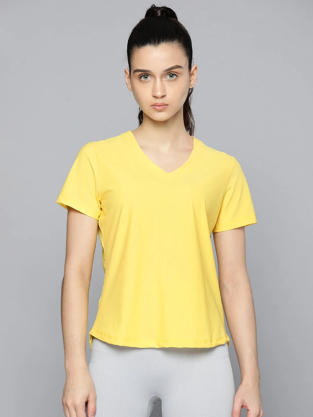 Fitkin Women Yellow Solid T-shirt With Curved Hem