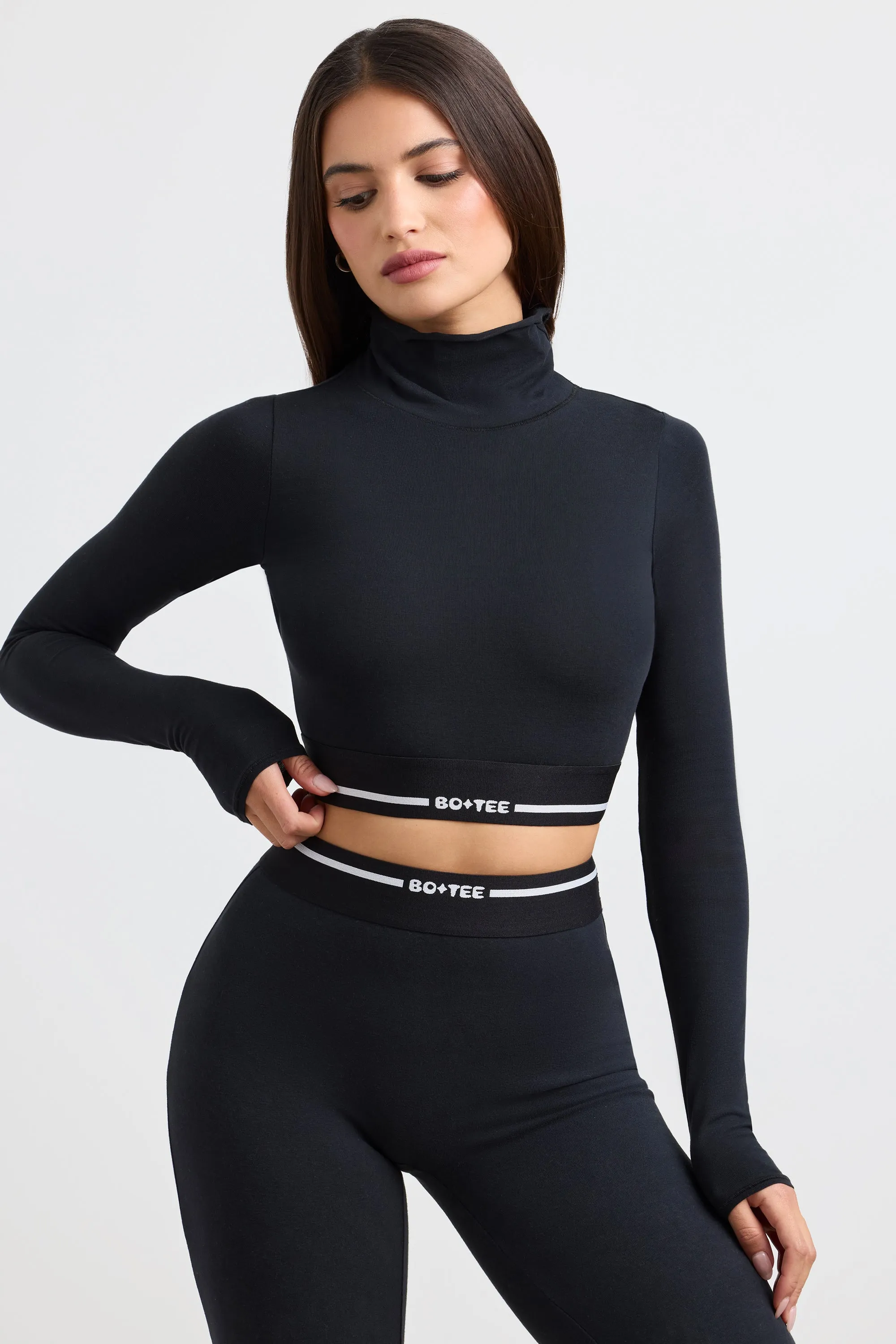 Grounded - Turtleneck Backless Long-Sleeve Crop Top in Black