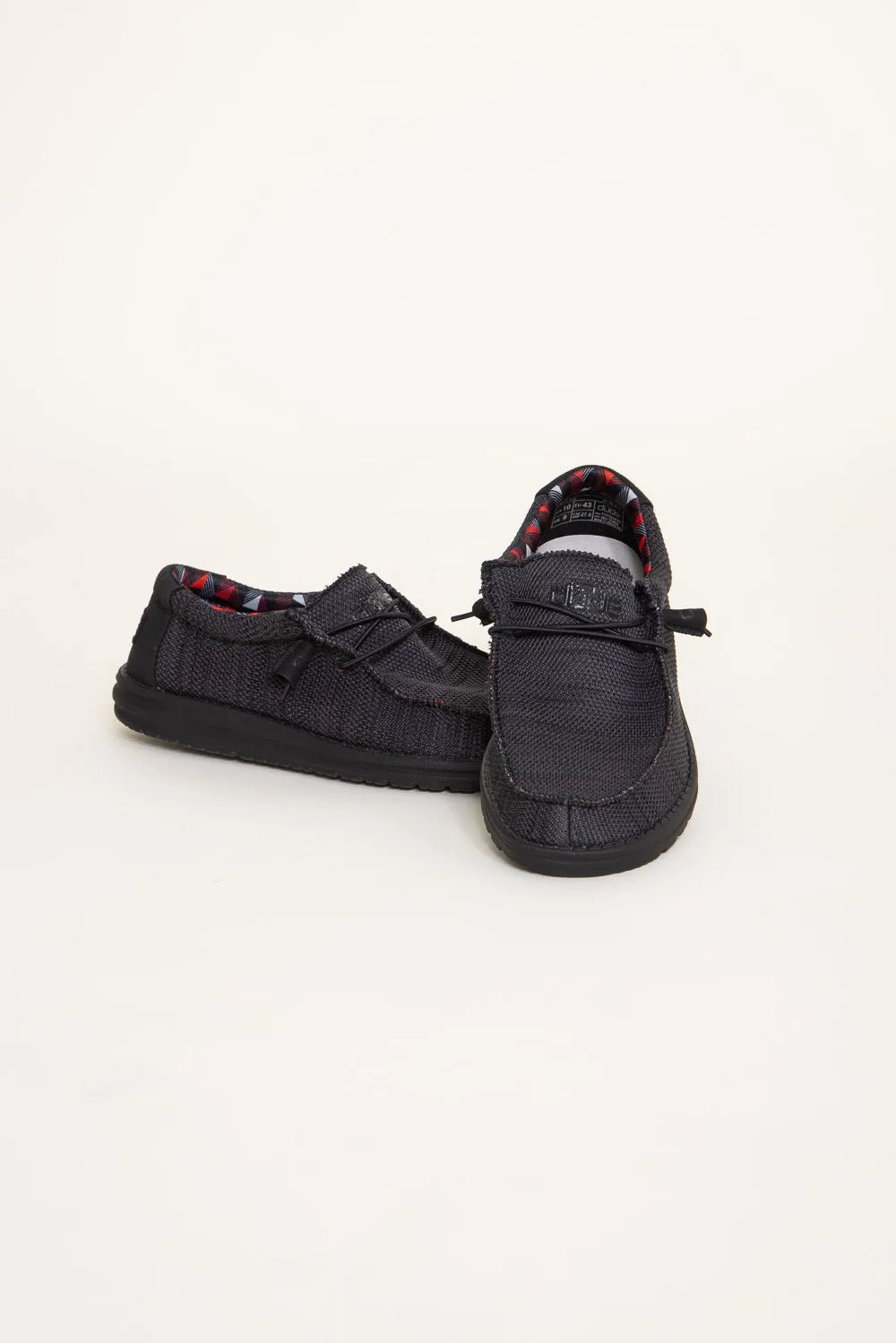 HEYDUDE Men’s Wally Sox Shoes in Jet Black | 110354935